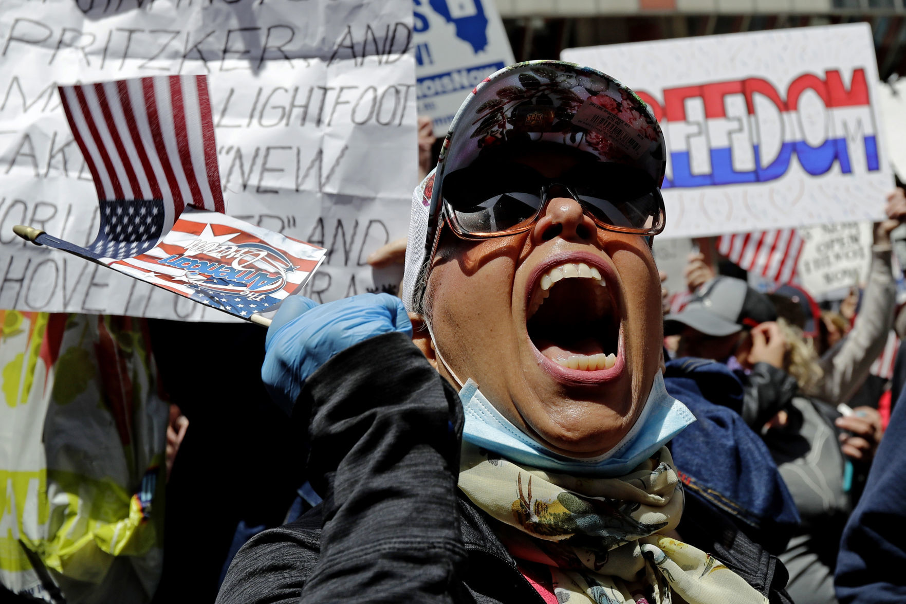 APTOPIX Virus Outbreak Illinois Protest